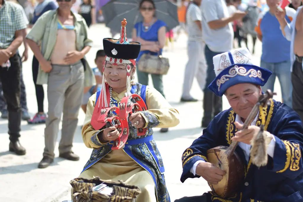 Musicians in traditional dress at a naadam