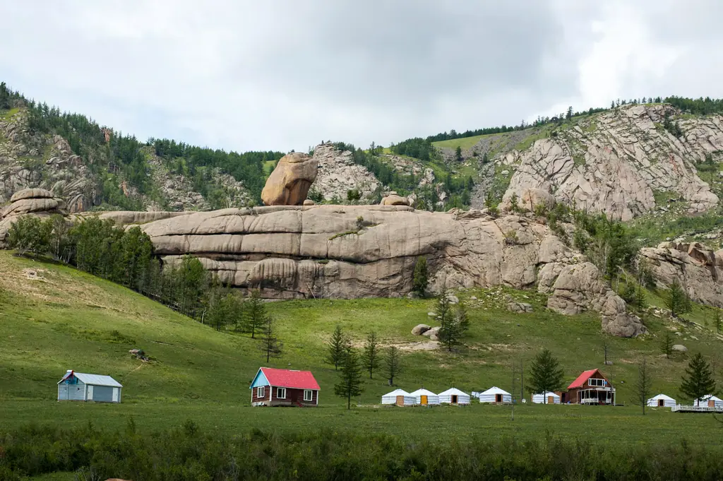 Granite cliffs and ger camps in a green Terelj valley