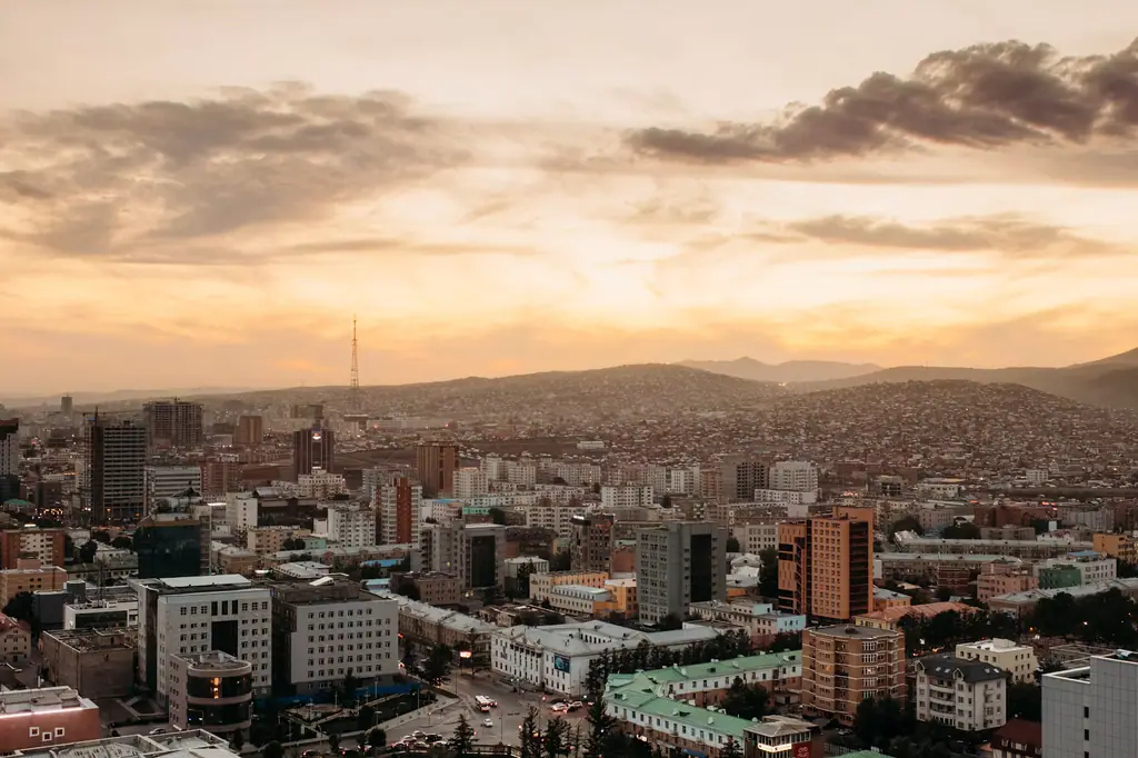 Ulaanbaatar at sunset, hills behind the city
